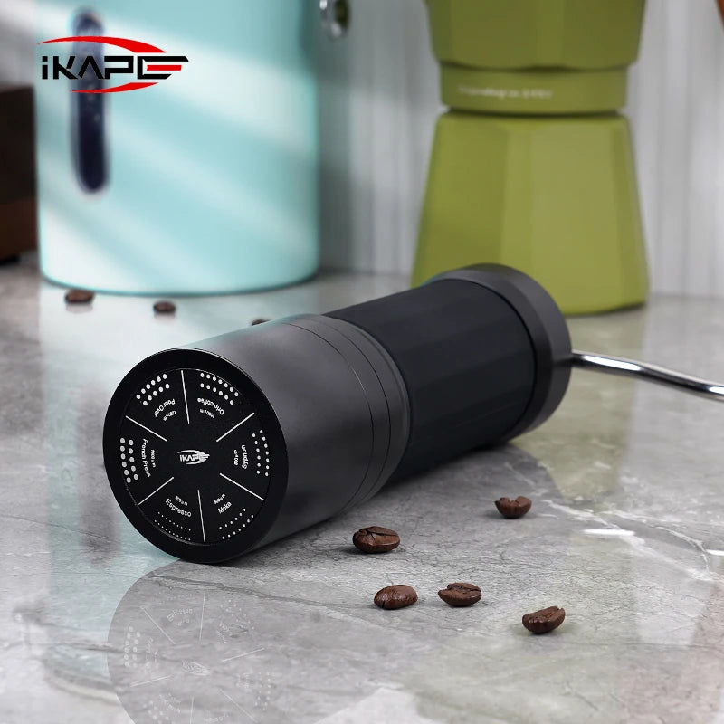 Molino de Café Manual IKAPE V2 – Moledor Portátil Premium con Rebabas Cónicas Heptagon y Molienda de Grado Ajustable